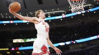Oct 16, 2025; Chicago, Illinois, USA; Chicago Bulls forward Matas Buzelis (14) goes up for a dunk against the Minnesota Timberwolves during the second half at United Center. Mandatory Credit: David Banks-Imagn Images