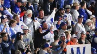 Chicago Cubs fans react after defeating the Milwaukee Brewers in game four of the NLDS round for the 2025 MLB playoffs at Wrigley Field.