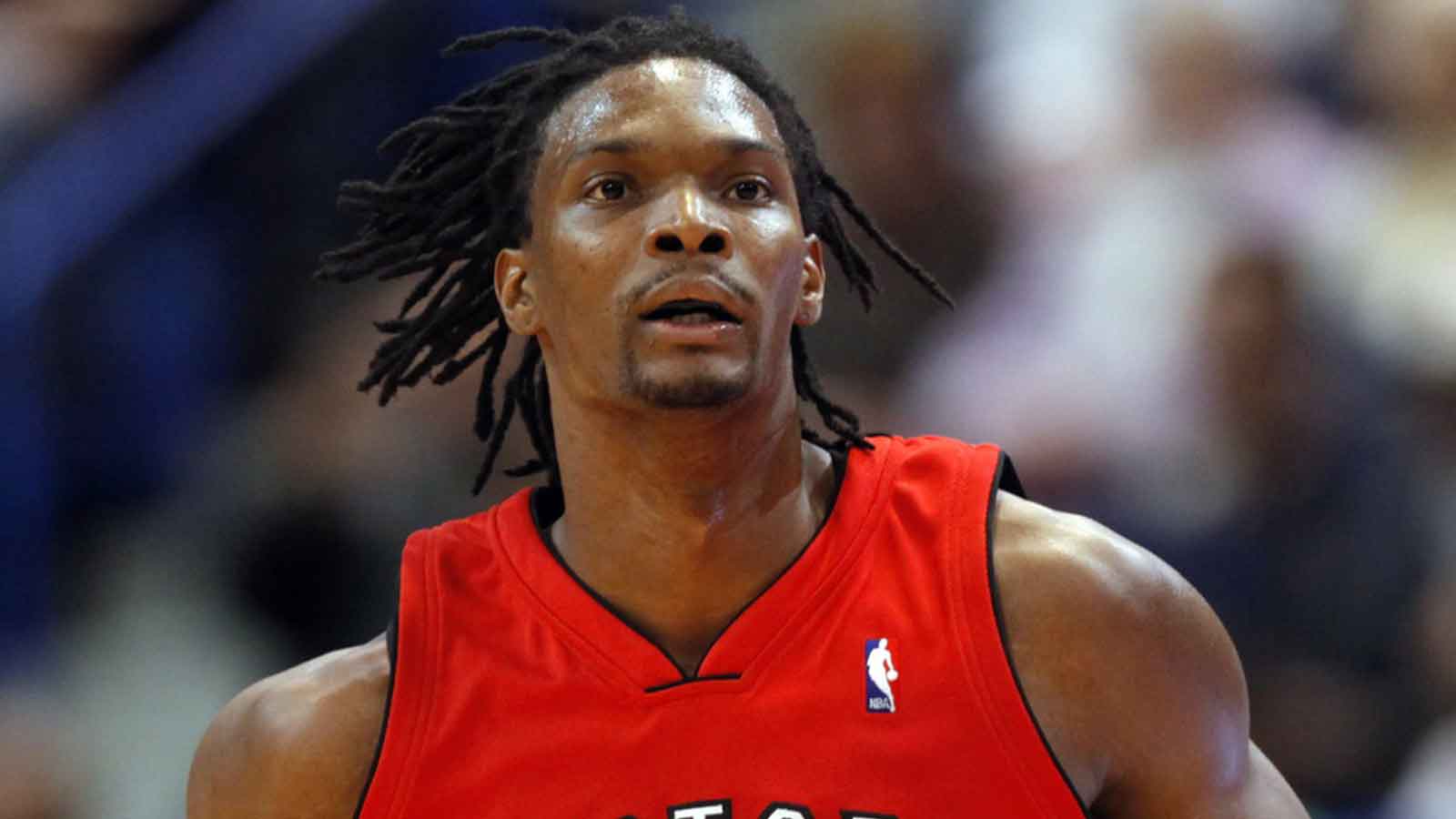 Toronto Raptors forward Chris Bosh (4) returns up court as his team takes on the Boston Celtics during the third quarter at the XL Center. The Celtics defeated the Raptors 106-90.