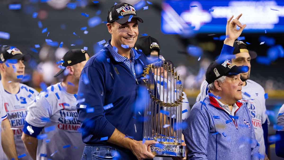 Texas Rangers general manager Chris Young celebrates with the trophy after winning the 2023 World Series in five game against the Arizona Diamondbacks at Chase Field.