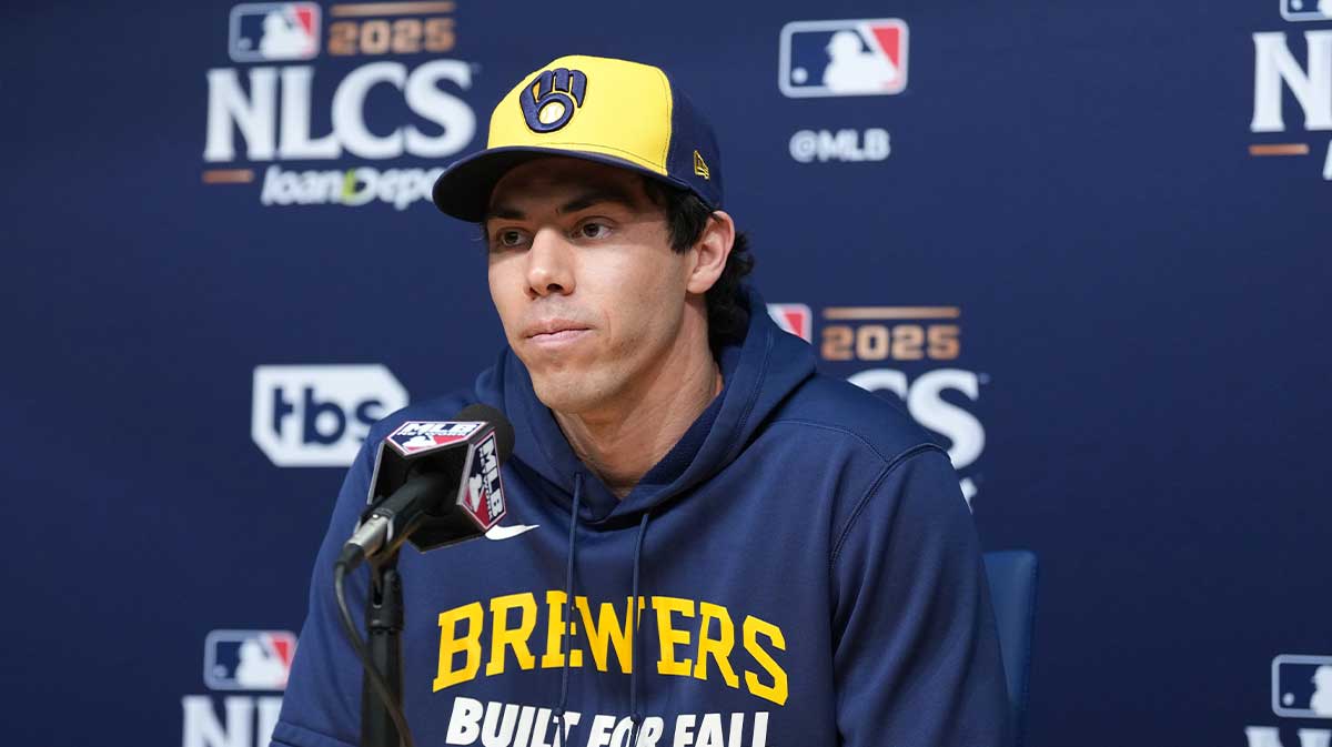 Milwaukee Brewers left fielder Christian Yelich (22) speaks in a press conference before game three against the Los Angeles Dodgers in the NLCS round for the 2025 MLB playoffs at Dodger Stadium.