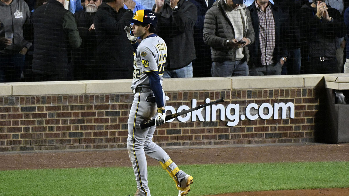 Milwaukee Brewers left fielder Christian Yelich (22) reacts after striking out against the Chicago Cubs in the fifth inning during game four of the NLDS round for the 2025 MLB playoffs at Wrigley Field.