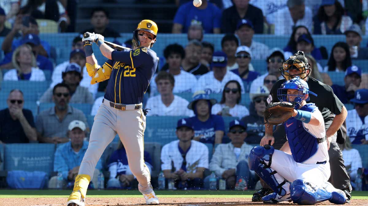 Milwaukee Brewers left fielder Christian Yelich (22) hits a single in the first inning during game three of the NLCS round for the 2025 MLB playoffs at Dodger Stadium.
