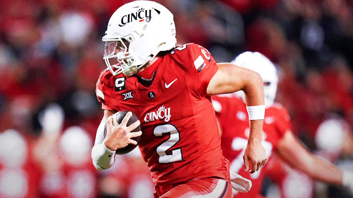 Cincinnati Bearcats quarterback Brendan Sorsby (2) runs the ball to the end zone for a touchdown in the fourth quarter of a NCAA men’s football game between the Cincinnati Bearcats and Baylor Bears, Saturday, Oct. 25, 2025, at Nippert Stadium in Cincinnati. Bearcats won 41-20.