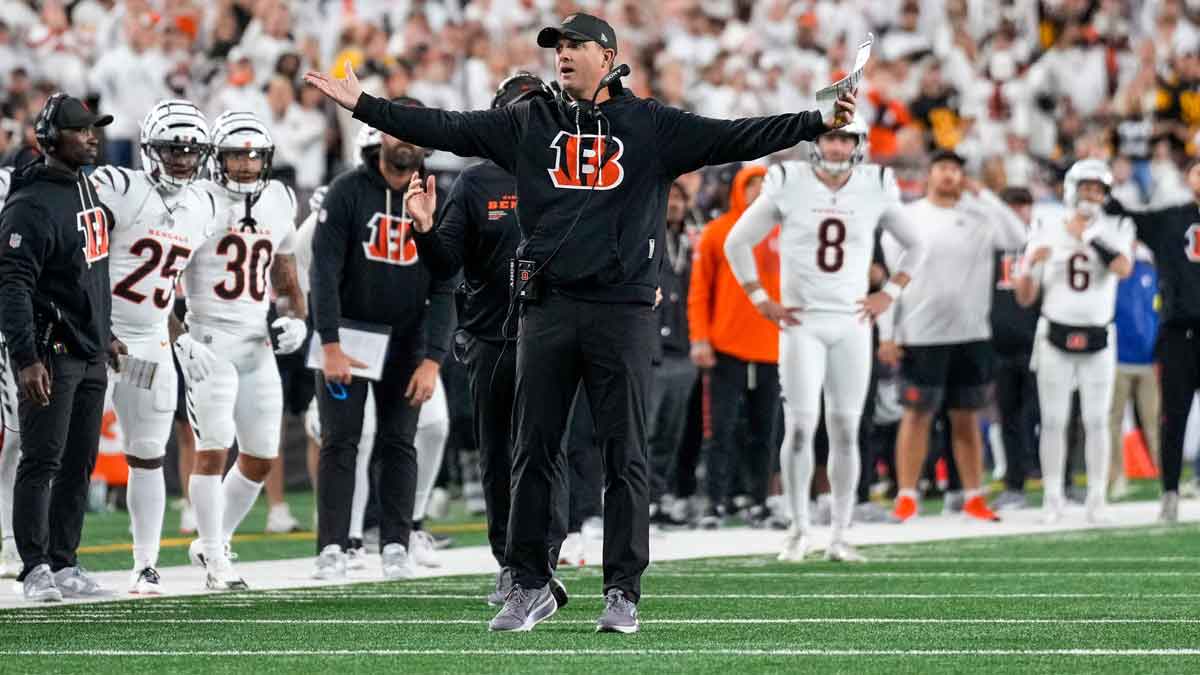 Cincinnati Bengals head coach Zac Taylor looks for a flag after a pass attempt to Tee Higgins in the fourth quarter of the NFL Week 7 game between the Cincinnati Bengals and the Pittsburgh Steelers at Paycor Stadium in downtown Cincinnati on Thursday, Oct. 16, 2025. The Bengals won, 33-31.