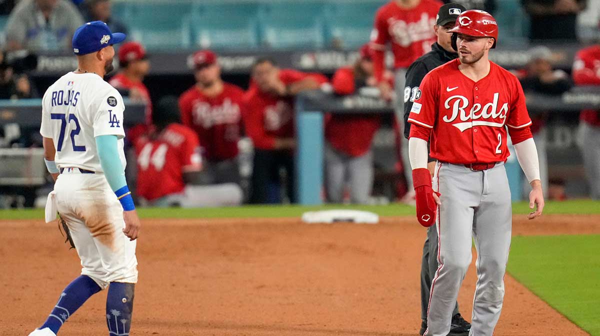 Cincinnati Reds left fielder Gavin Lux (2) stands on second base in the ninth inning of the MLB National League Wild Card Game 1 between the Los Angeles Dodgers and the Cincinnati Reds at Dodger Stadium in Los Angeles on Tuesday, Sept. 30, 2025. The Dodgers won game 1 of the series, 10-5.