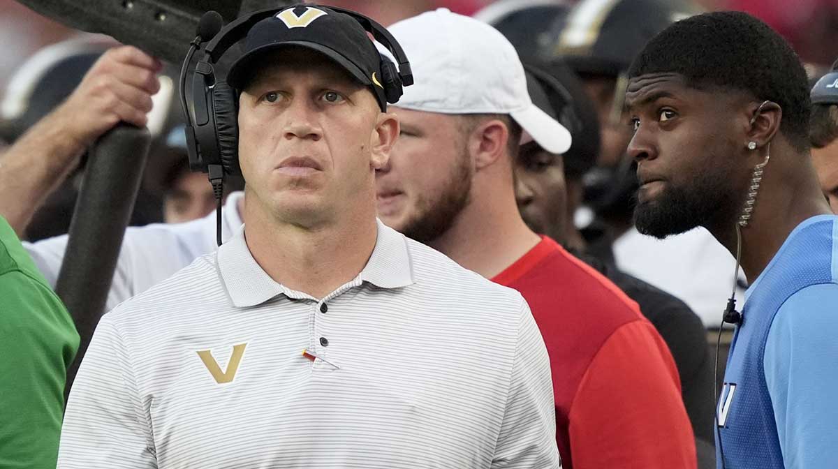 Vanderbilt head coach Clark Lea checks the clock after calling a timeout late in the game at Saban Field at Bryant-Denny Stadium. Alabama downed Vanderbilt 30-14