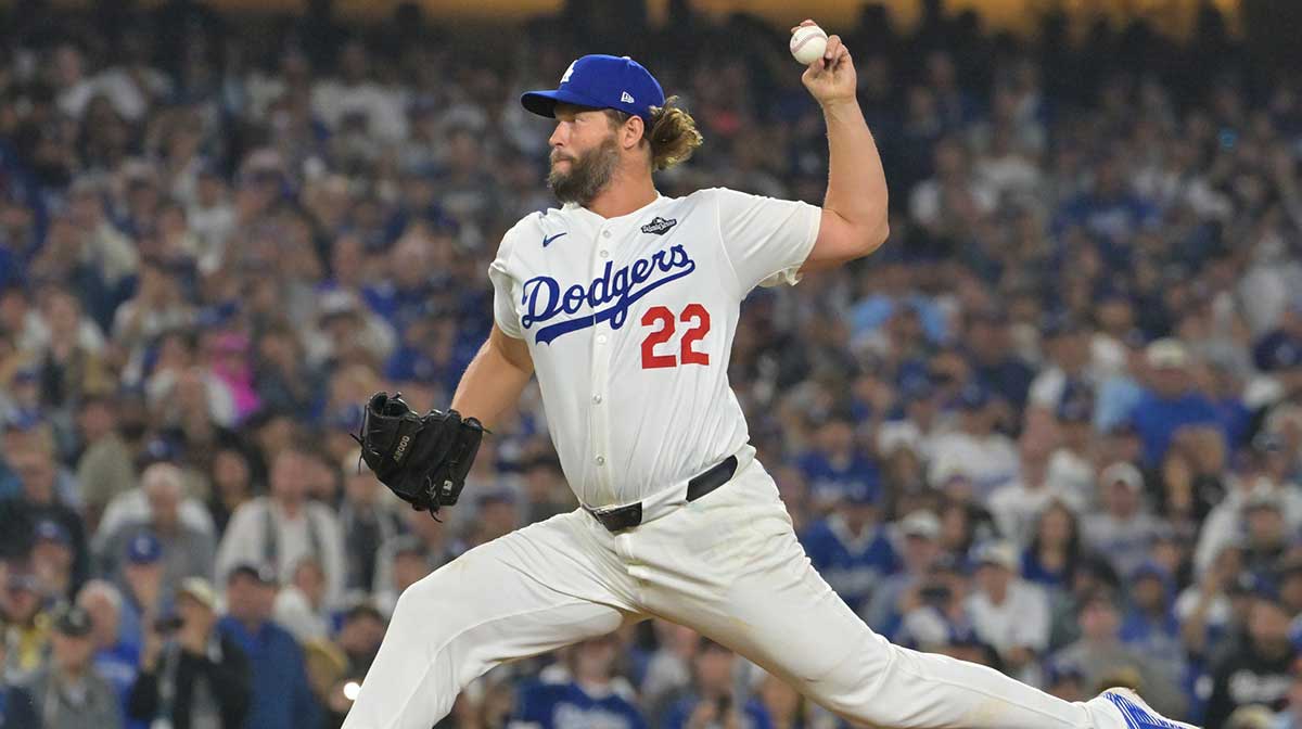 Los Angeles Dodgers pitcher Clayton Kershaw (22) pitches against the Toronto Blue Jays in the twelfth inning during game three of the 2025 MLB World Series at Dodger Stadium.