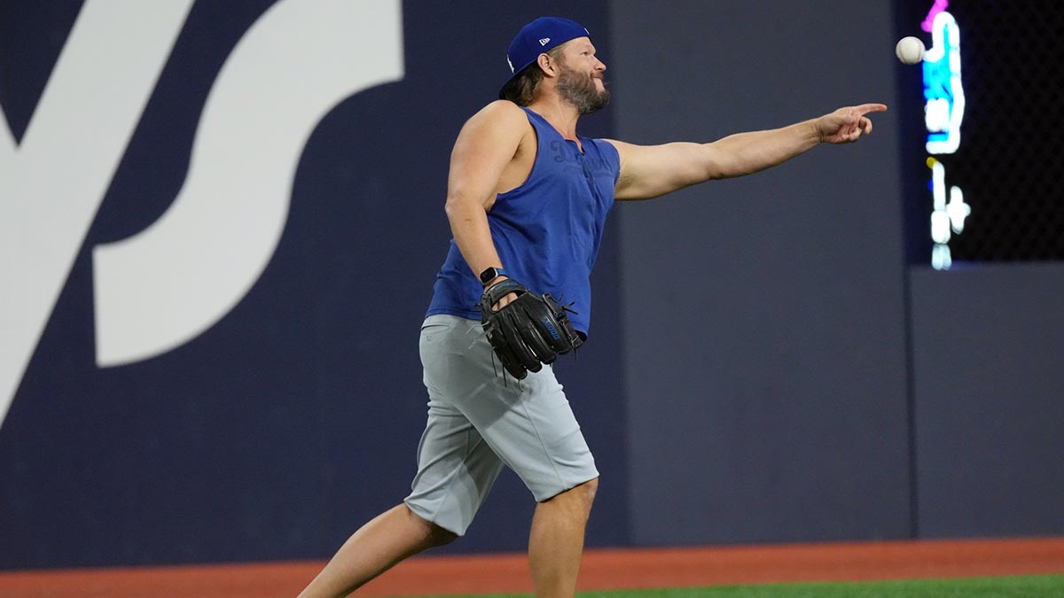 Los Angeles Dodgers pitcher Clayton Kershaw (22) warms up before game two of the 2025 MLB World Series against the Toronto Blue Jays at Rogers Centre.