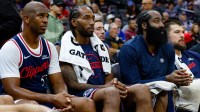 Los Angeles Clippers guard Chris Paul (3) and forward Kawhi Leonard (2) and guard James Harden (1) sit on the bench during the fourth quarter against the Sacramento Kings at Golden 1 Center.