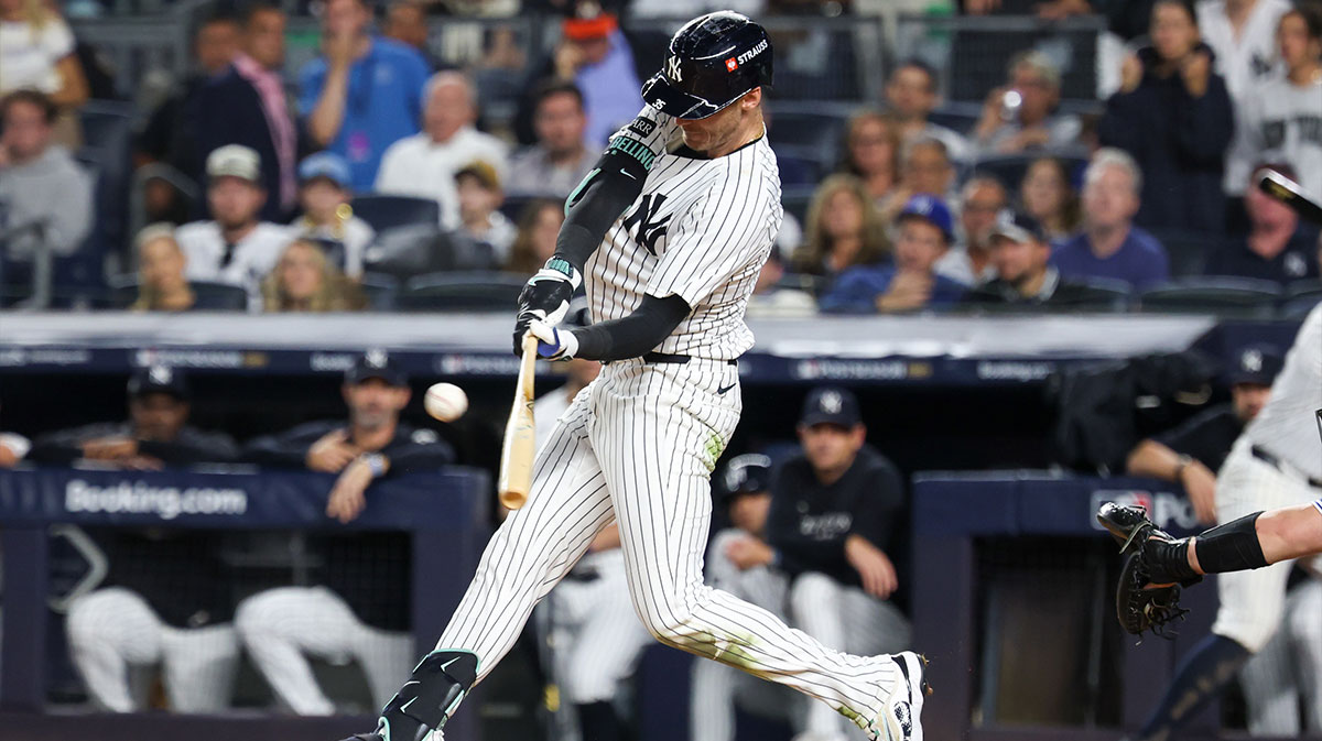 New York Yankees outfielder Cody Bellinger (35) hits a double in the sixth inning against the Toronto Blue Jays during game three of the ALDS round for the 2025 MLB playoffs at Yankee Stadium.