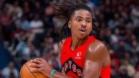 Toronto Raptors forward Collin Murray-Boyles (12) handles the ball against the Denver Nuggets in the second half at Rogers Arena.