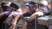 Colorado Rockies interim manager Warren Schaeffer (34) watches his team take on the San Francisco Giants during the second inning at Oracle Park.