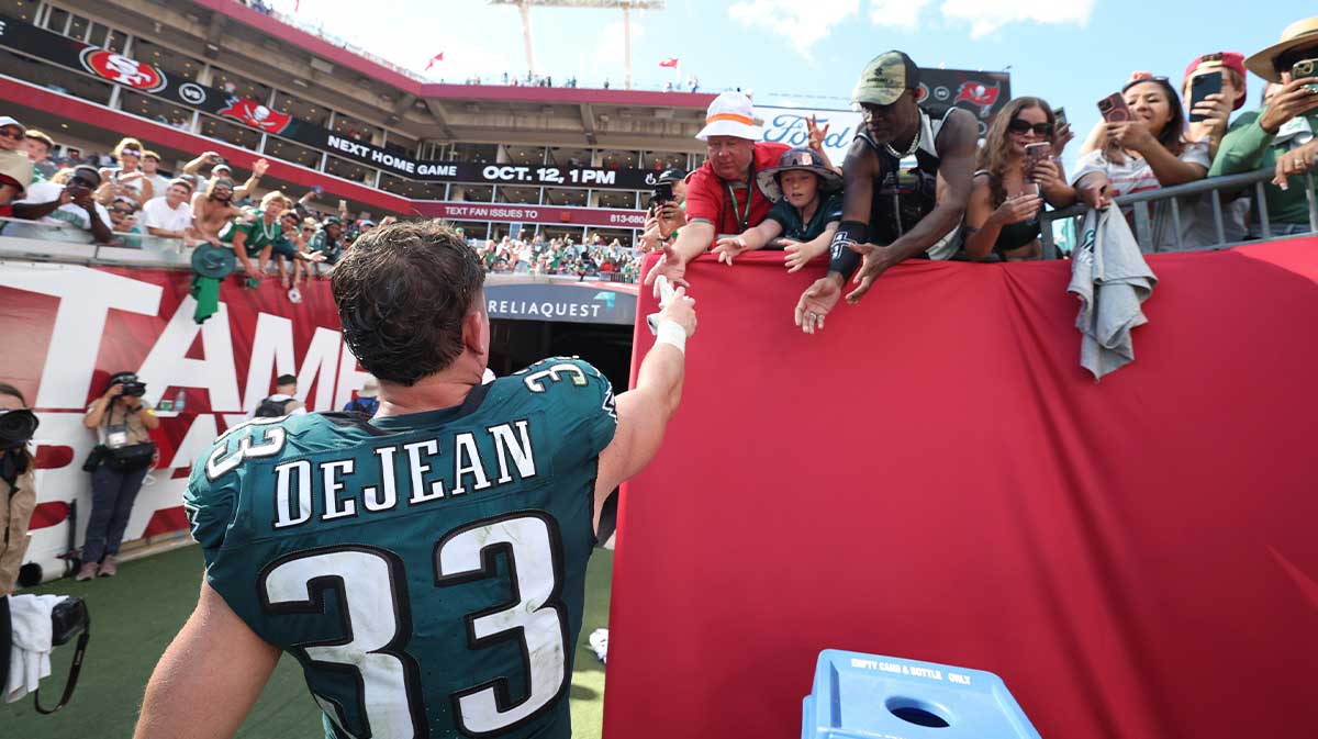 Philadelphia Eagles cornerback Cooper Dejean (33) high fives fans after the game against the Tampa Bay Buccaneers at Raymond James Stadium.