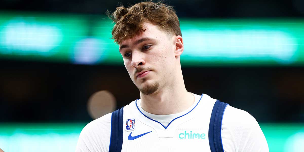 Dallas Mavericks forward Cooper Flagg (32) reacts against the San Antonio Spurs during the first half at American Airlines Center.