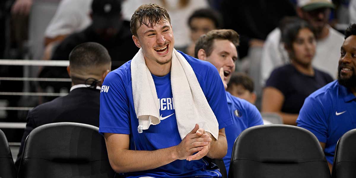 Dallas Mavericks forward Cooper Flagg (32) looks on from the team bench during the second half against the Oklahoma City Thunder at Dickie's Arena.