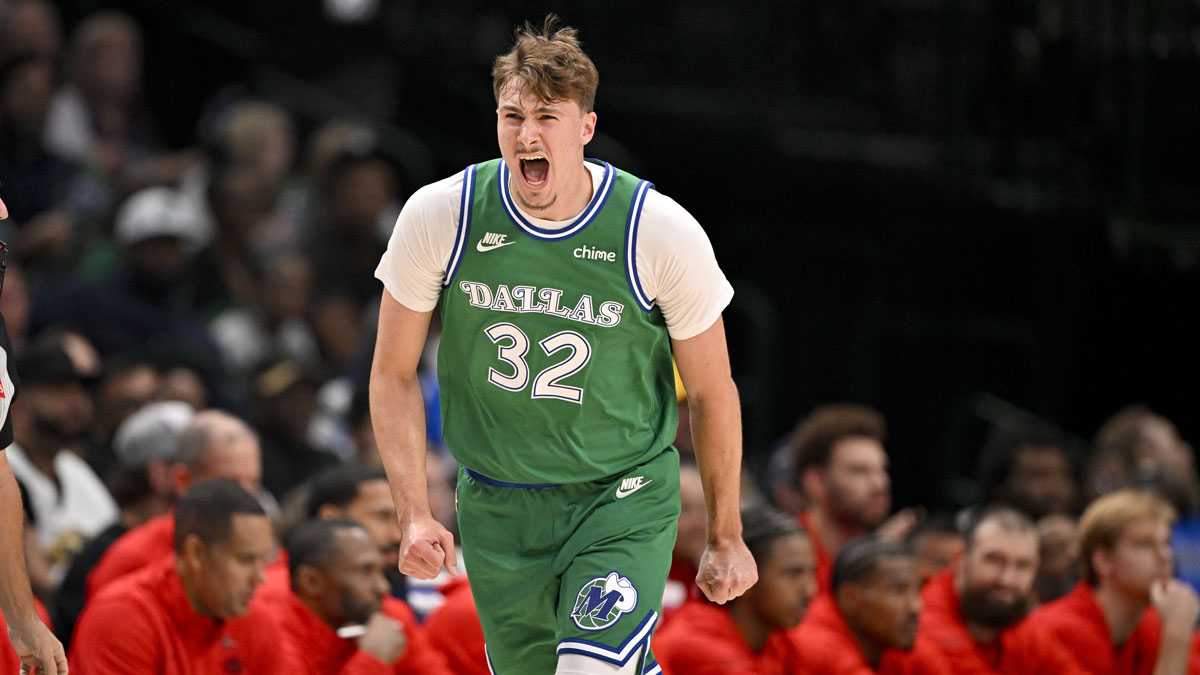 Dallas Mavericks forward Cooper Flagg (32) celebrates during the first quarter against the Toronto Raptors at the American Airlines Center.