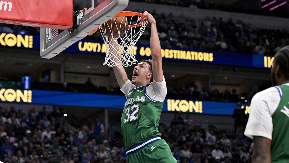 Dallas Mavericks forward Cooper Flagg (32) dunks the ball during the third quarter against the Toronto Raptors at the American Airlines Center.