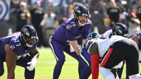 Baltimore Ravens quarterback Cooper Rush (15) snaps the ball during the first quarter against the Houston Texans at M&T Bank Stadium.