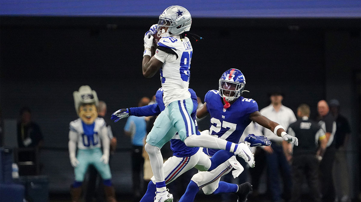 Dallas Cowboys wide receiver CeeDee Lamb (88) makes a catch against New York Giants safety Tyler Nubin (27) during the fourth quarter at AT&T Stadium.