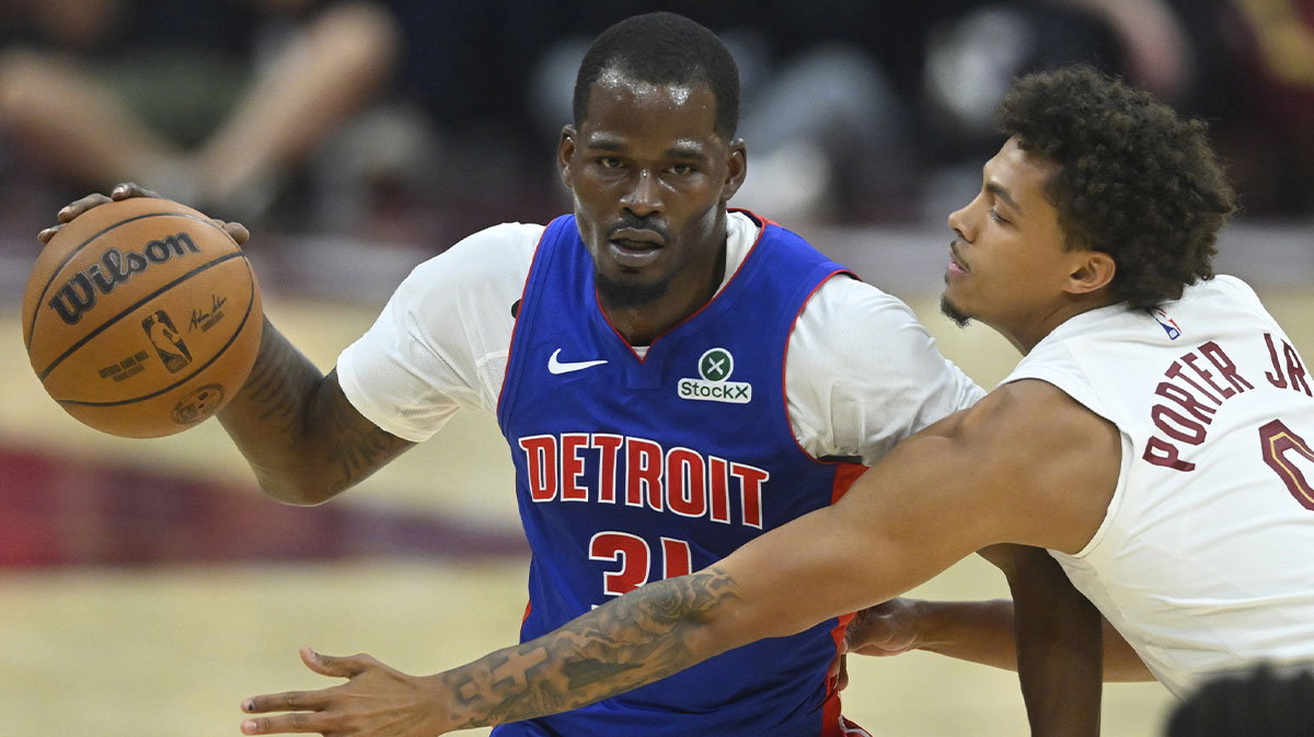 Detroit Pistons forward Javonte Green (0) dribbles beside Cleveland Cavaliers guard Craig Porter Jr. (9) in the second quarter at Rocket Arena.