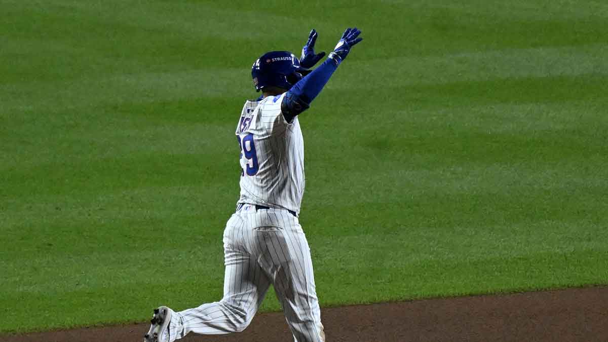 Chicago Cubs first baseman Michael Busch (29) reacts after hitting a home run against the Milwaukee Brewers during the eighth inning in game four of the NLDS round for the 2025 MLB playoffs at Wrigley Field.