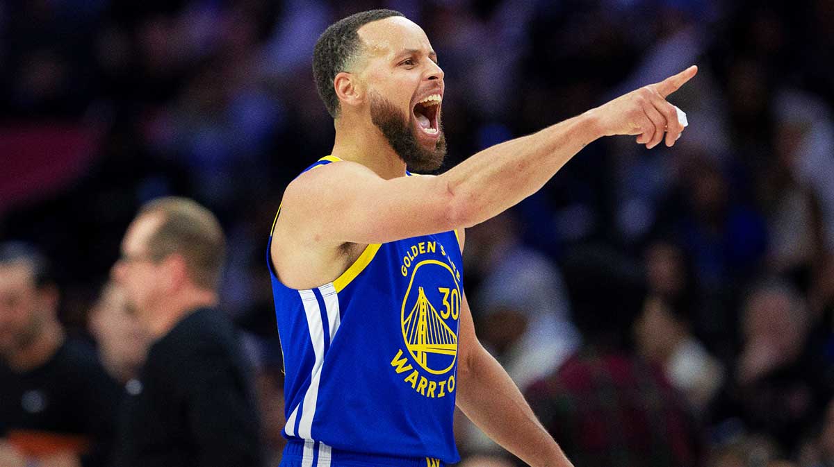 Golden State Warriors guard Stephen Curry (30) reacts after his dunk against the Philadelphia 76ers during the fourth quarter at Wells Fargo Center.