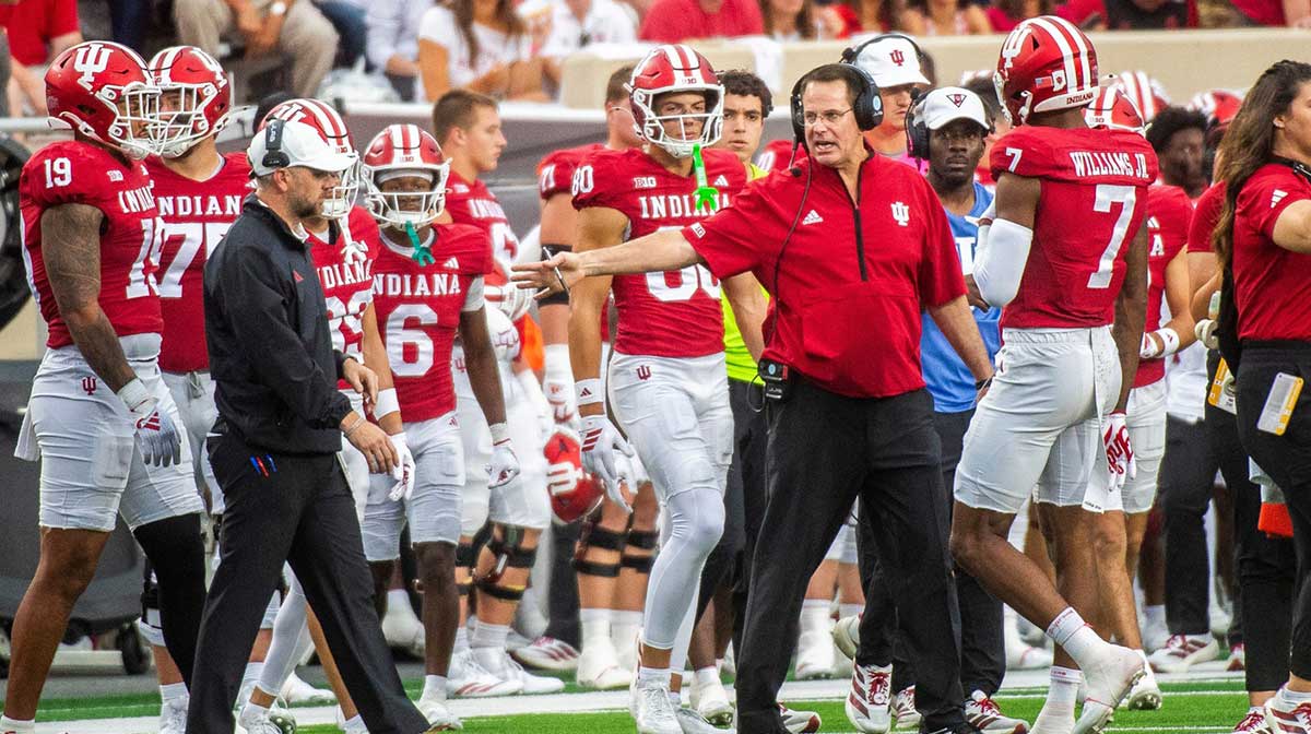 Indiana Head Coach Curt Cignetti discusses a play with E.J.. Williams (7) during the Indiana versus Michigan State football game at Memorial Stadium on Saturday, Oct. 18, 2025.