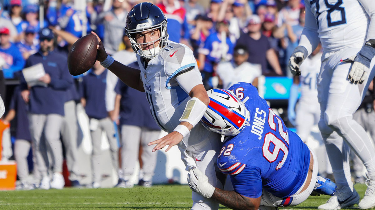 Buffalo Bills defensive tackle DaQuan Jones (92) sacks Tennessee Titans quarterback Mason Rudolph (11) during the second half at Highmark Stadium.