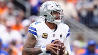 Dallas Cowboys quarterback Dak Prescott (4) looks to throw against the Denver Broncos in the first half at Empower Field at Mile High.