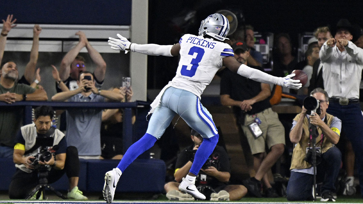 Dallas Cowboys wide receiver George Pickens (3) celebrates after scoring a touchdown against the Green Bay Packers in the fourth quarter at AT&T Stadium