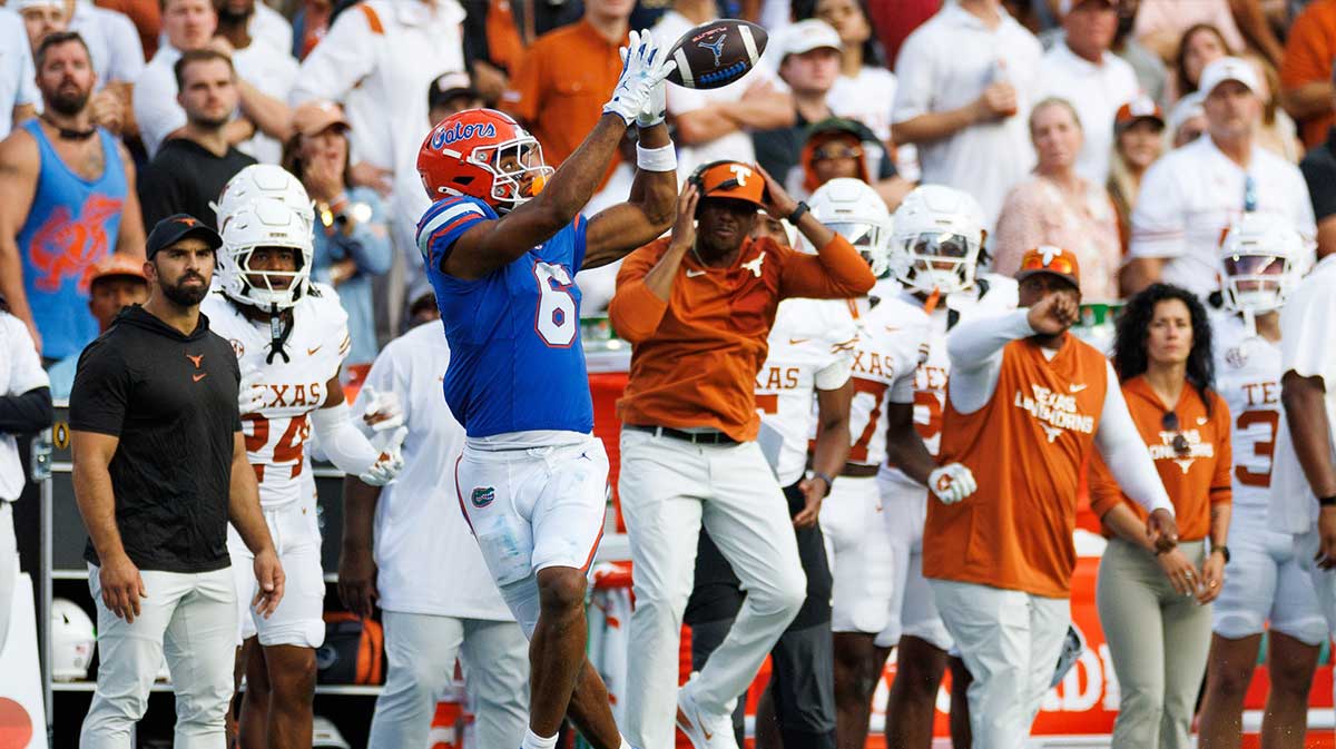 Florida Gators wide receiver Dallas Wilson (6) makes a catch for a touchdown against the Texas Longhorns during the second half at Ben Hill Griffin Stadium.