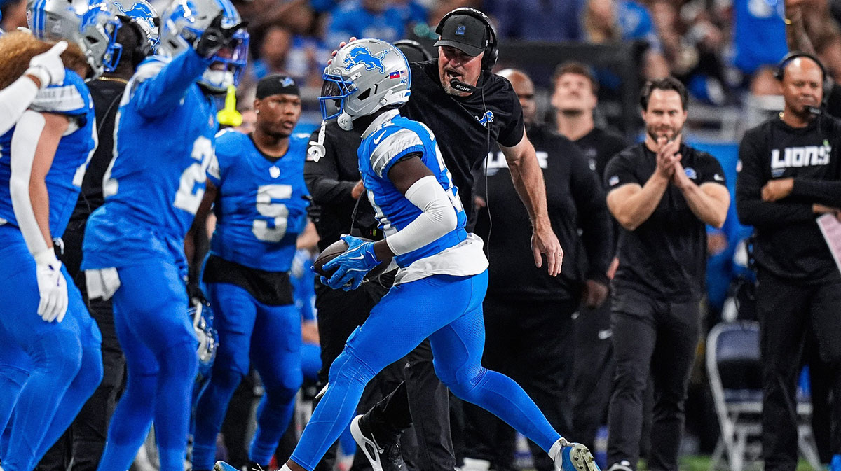 Detroit Lions head coach Dan Campbell celebrates an interception caught by safety Kerby Joseph (31) against Cleveland Browns during the first half at Ford Field in Detroit on Sunday, Sept. 28, 2025.