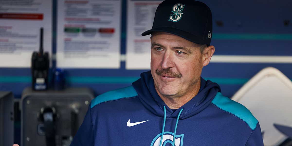 Sep 23, 2025; Seattle, Washington, USA; Seattle Mariners manager Dan Wilson (6) talks in the dugout before a game against the Colorado Rockies at T-Mobile Park. 
