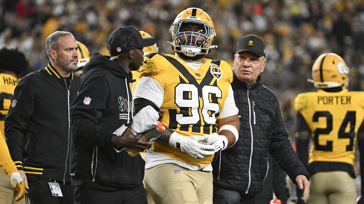 Pittsburgh Steelers defensive tackle Daniel Ekuale (96) reacts after an apparent injury during the second quarter against the Green Bay Packersat Acrisure Stadium.
