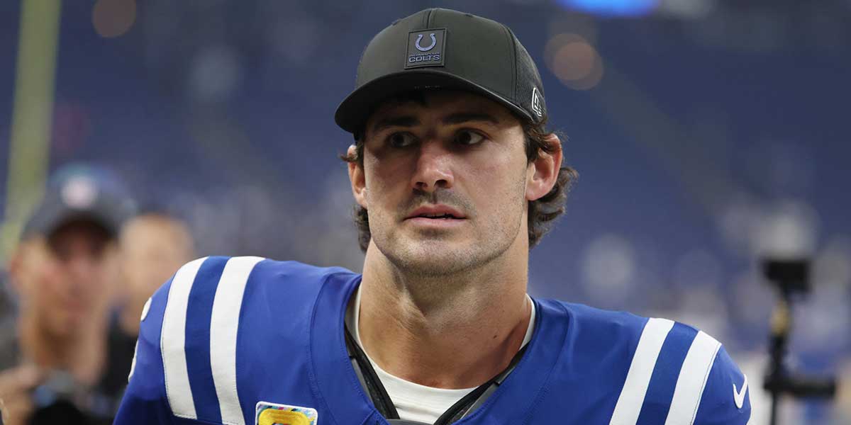 Indianapolis Colts quarterback Daniel Jones (17) walks off the field after their win against the Las Vegas Raiders at Lucas Oil Stadium.