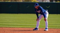 Los Angeles Dodgers bench coach Danny Lehmann (0) looks on during live batting practice during a spring training workout at Camelback Ranch.
