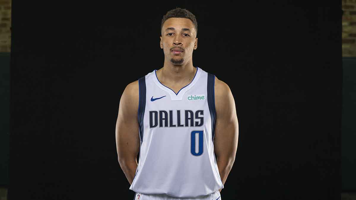 Dallas Mavericks guard Dante Exum (0) poses for a photo during the Mavericks 2025 media day at the American Airlines Center.
