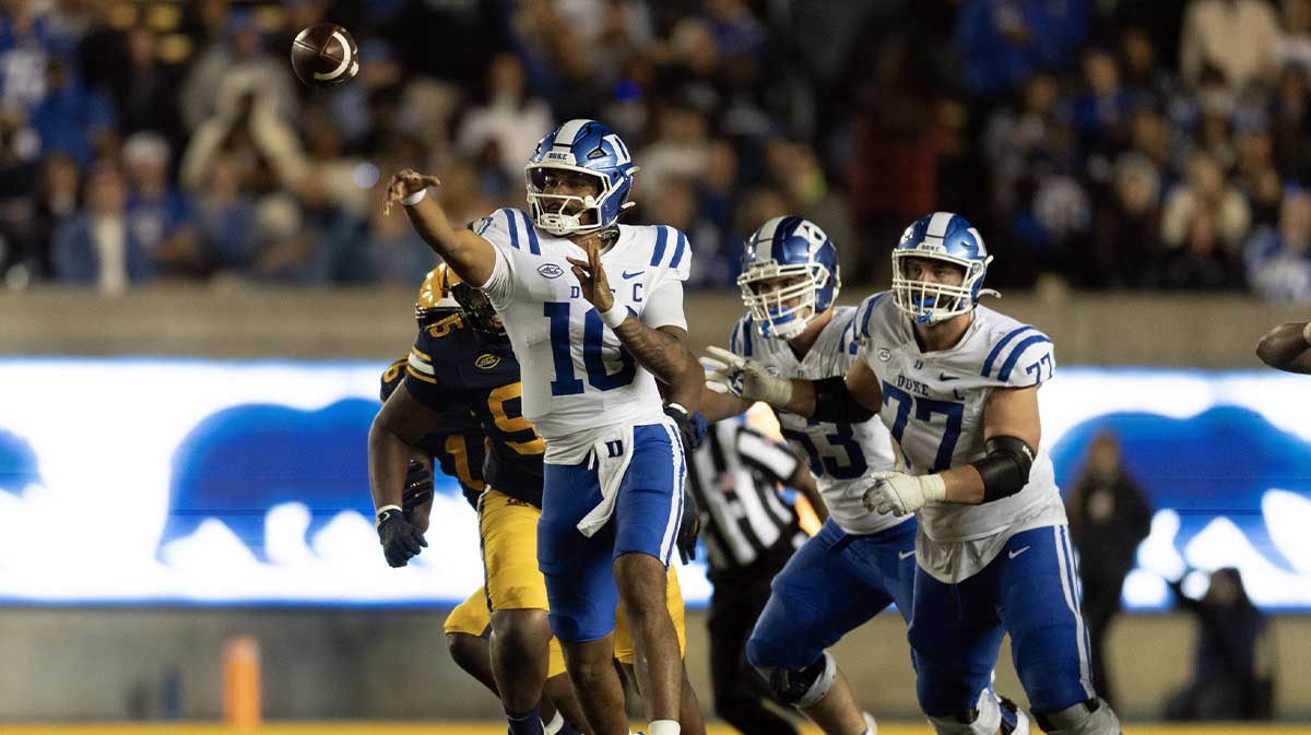 Duke Blue Devils quarterback Darian Mensah (10) throws on the run against the California Golden Bears during the fourth quarter at California Memorial Stadium. Mandatory Credit: D. Ross Cameron-Imagn Images