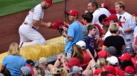 St. Louis Cardinals first baseman Paul Goldschmidt (46) signs autographs for fans prior to a game against the Miami Marlins at Busch Stadium.