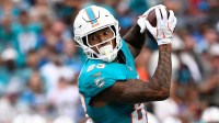 Miami Dolphins tight end Darren Waller (83) catches the ball in the first quarter at Bank of America Stadium.