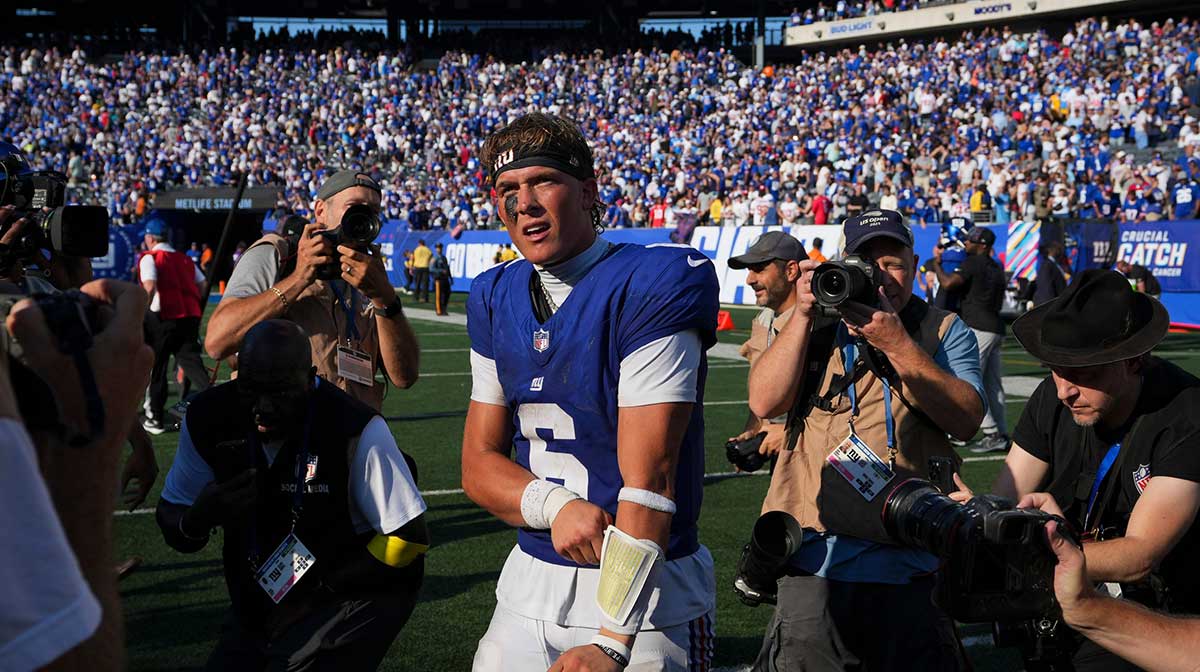 New York Giants quarterback Jaxson Dart (6) walks on the field after defeating the Los Angeles Chargers at MetLife Stadium, Sep 28, 2025, East Rutherford, NJ, USA.