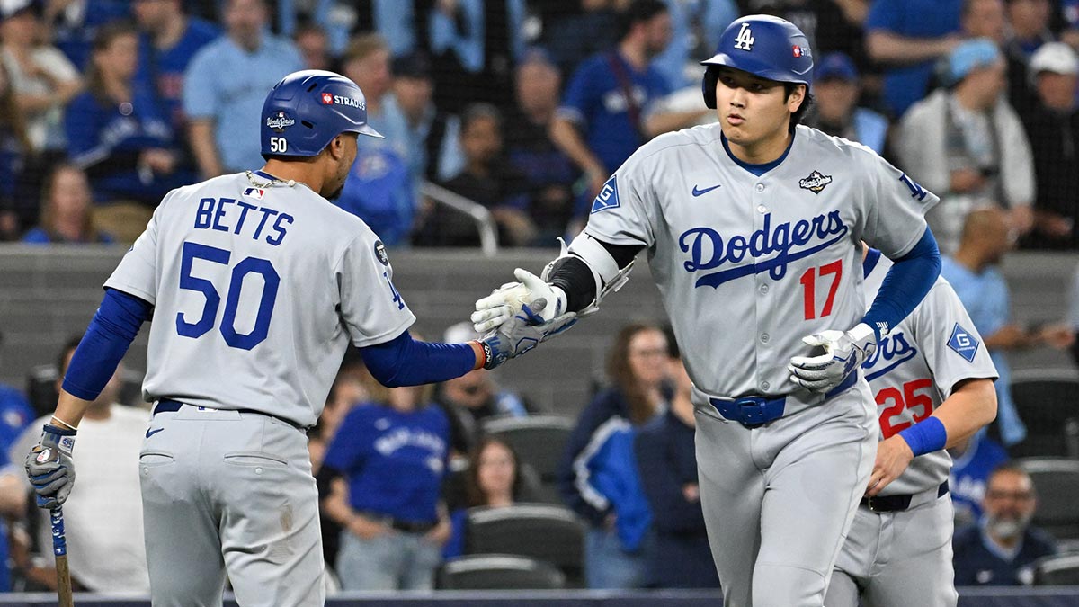 Los Angeles Dodgers designated hitter Shohei Ohtani (17) celebrates after hitting a two-run home run against the Toronto Blue Jays in the seventh inning during game one of the 2025 MLB World Series at Rogers Centre.