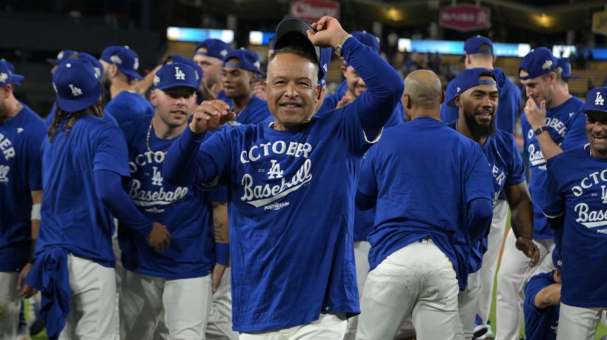 Los Angeles Dodgers manager Dave Roberts (30) celebrates after defeating the Cincinnati Reds in game two of the Wildcard round for the 2025 MLB playoffs at Dodger Stadium.
