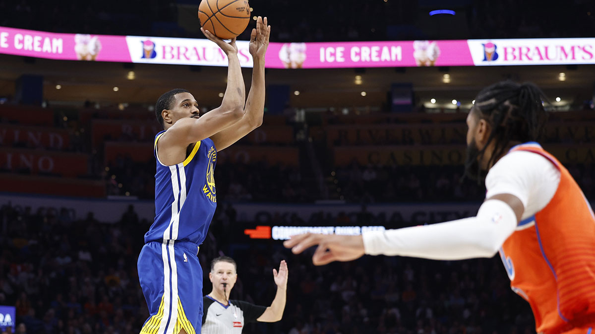 Golden State Warriors guard De'Anthony Melton (8) shoots a three point basket against the Oklahoma City Thunder during the second half at Paycom Center.