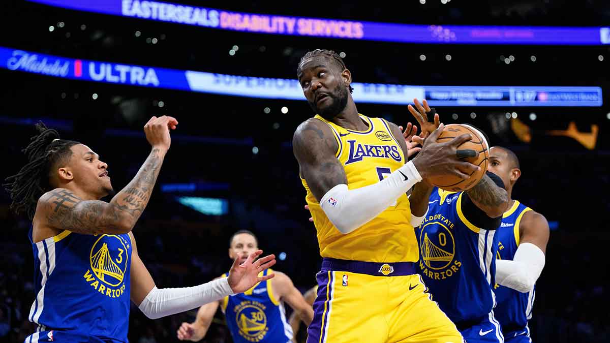 Los Angeles Lakers center Deandre Ayton (5) grabs a rebound against Golden State Warriors guard Gary Payton II (0) during the first half at Crypto.com Arena.