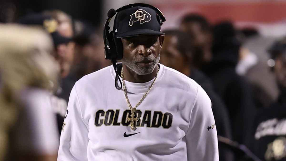 Colorado Buffaloes head coach Deion Sanders looks on during a time out in the game against the Utah Utes during the second quarter at Rice-Eccles Stadium.