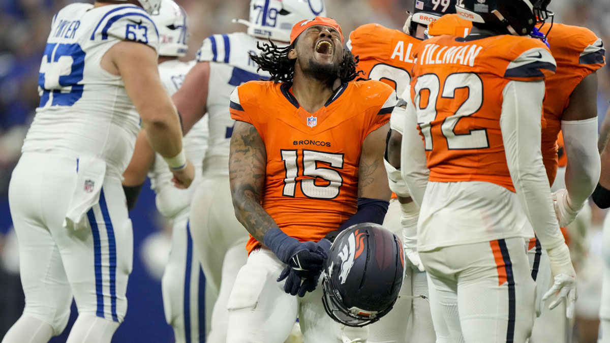 Denver Broncos linebacker Nik Bonitto (15) reacts after a missed field goal by Indianapolis Colts place kicker Spencer Shrader (3) at Lucas Oil Stadium.