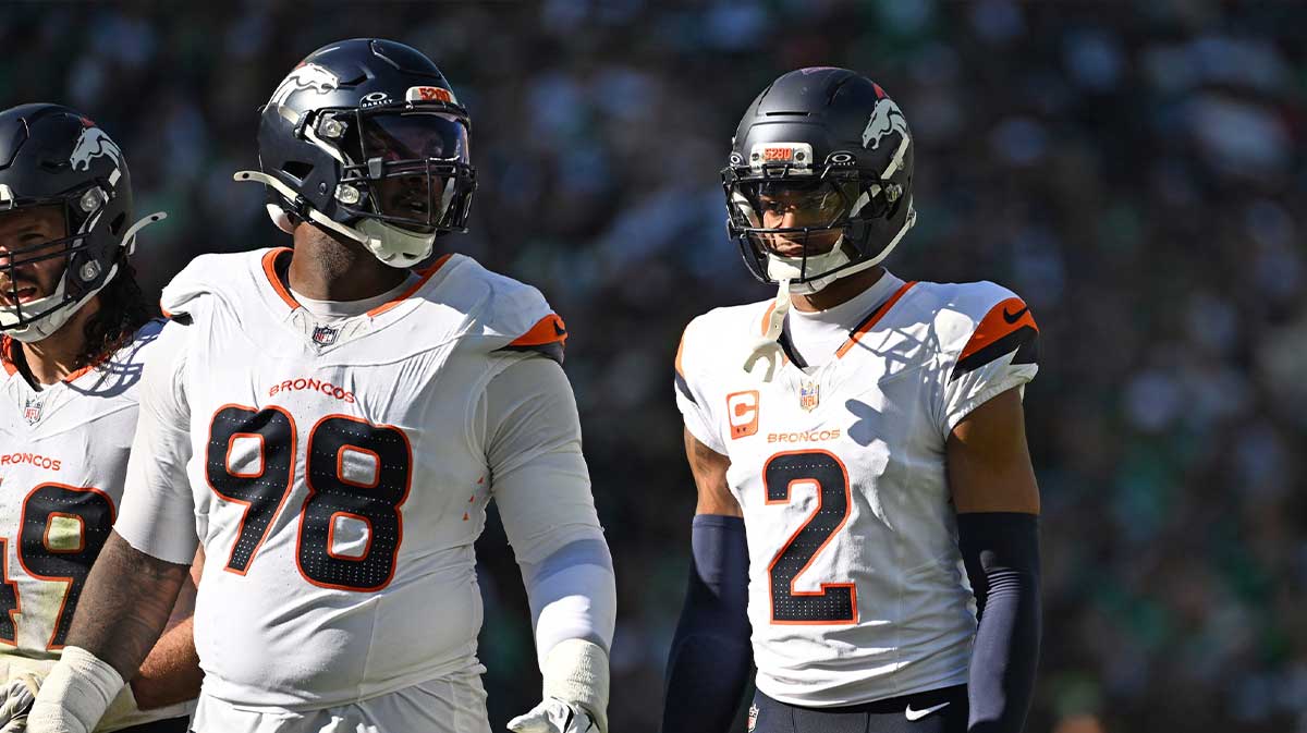Denver Broncos defensive end John Franklin-Myers (98) and cornerback Pat Surtain II (2) against the Philadelphia Eagles