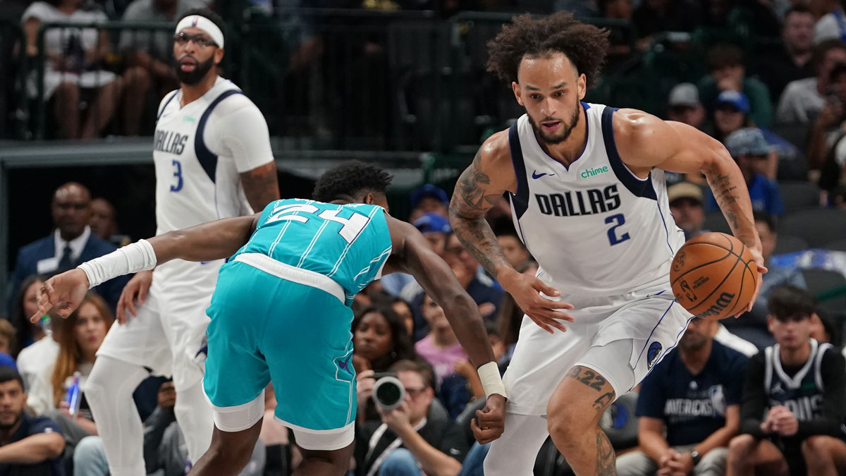Dallas Mavericks center Dereck Lively II (2) makes a steal on Charlotte Hornets forward Brandon Miller (24) in the second half of a game at American Airlines Center.